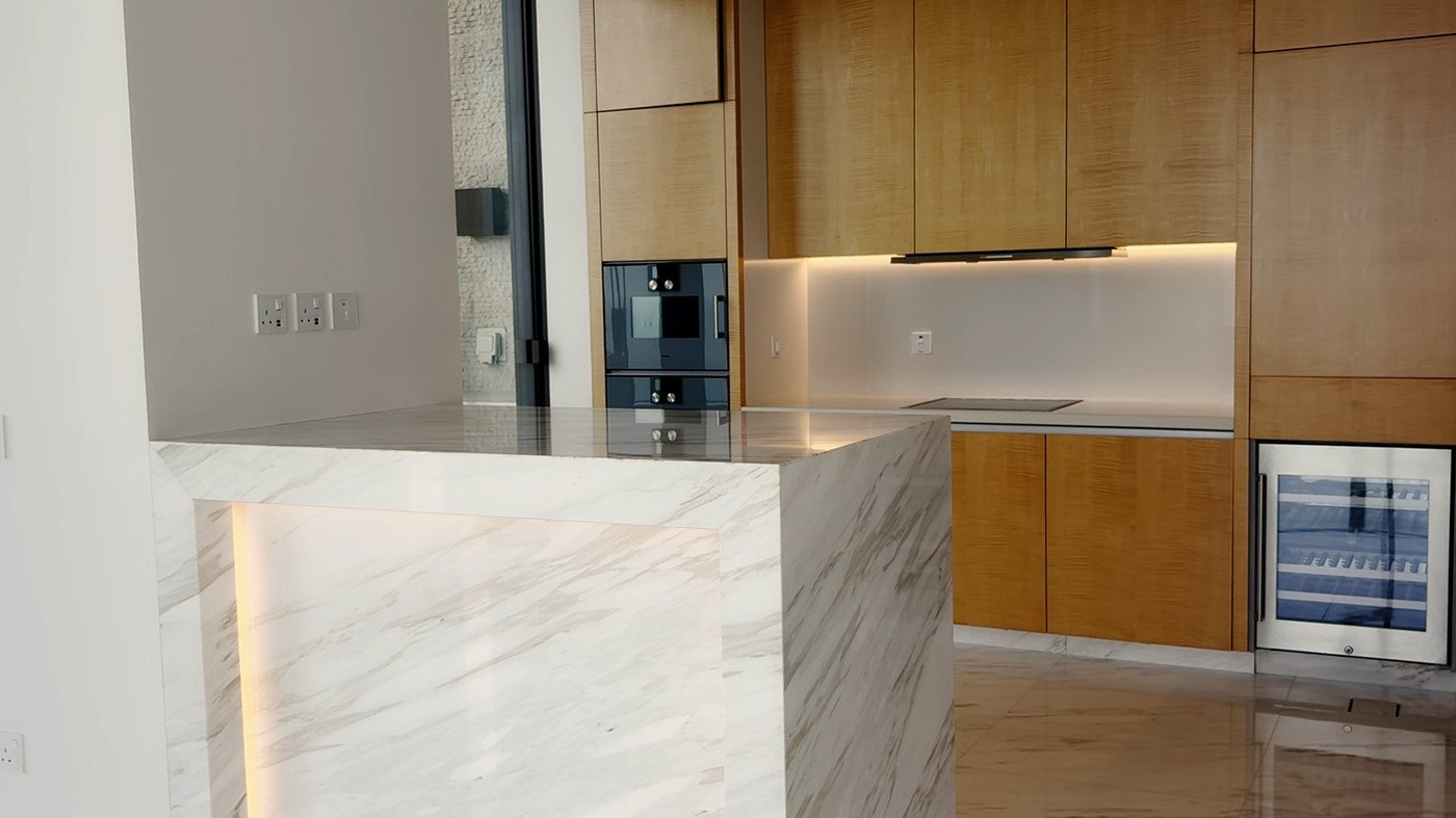 Dubai property tour, marble and oak kitchen