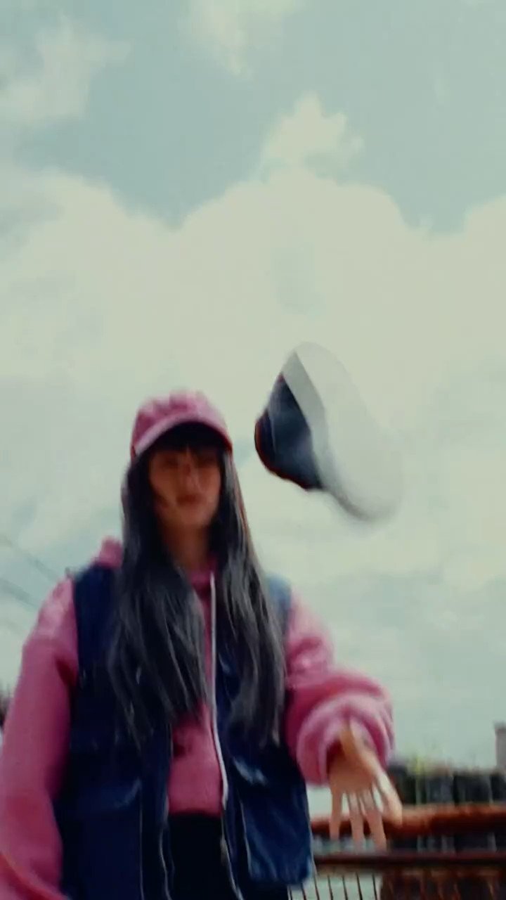 Street style reel, model in a pink jacket